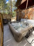 Private Outdoor Hot Tub at Cozy Woods Cabin